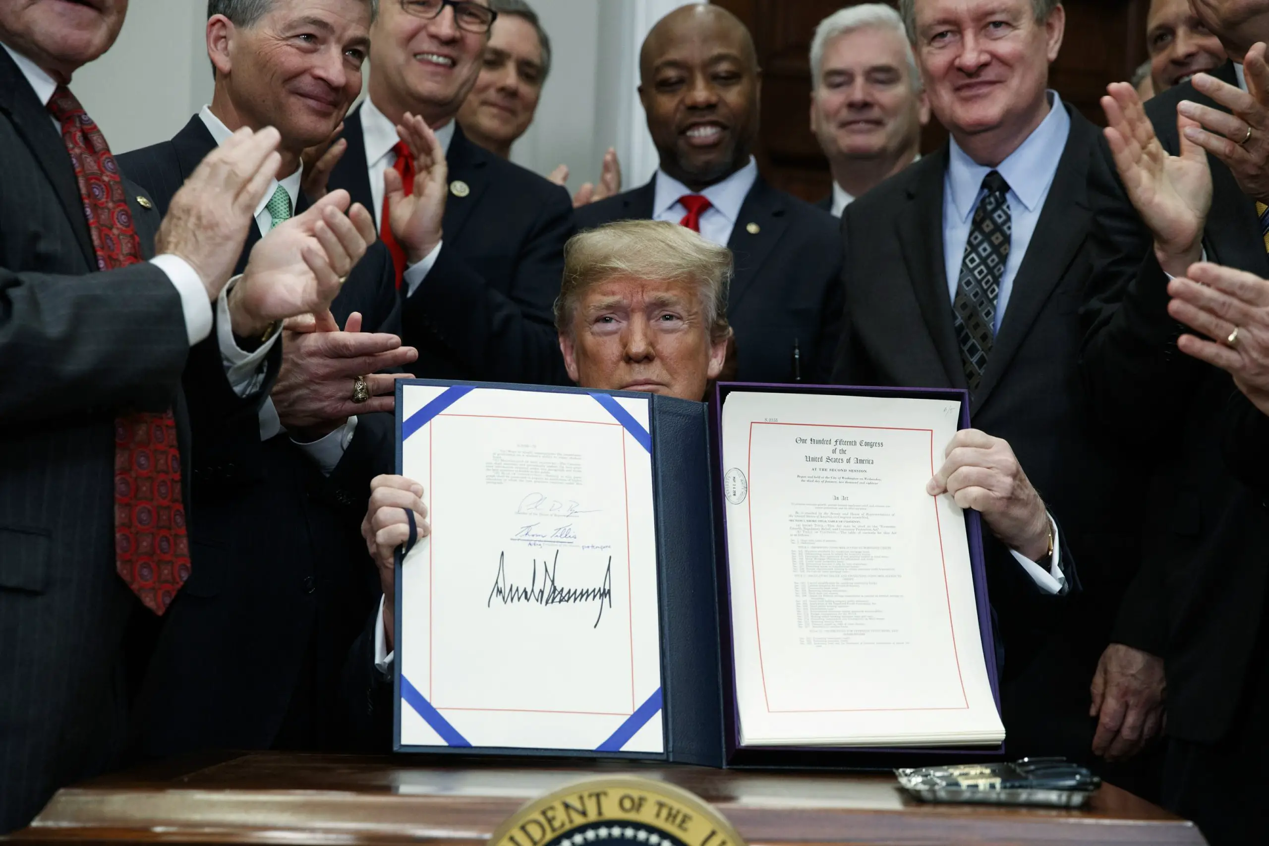 Trump signs bill easing post