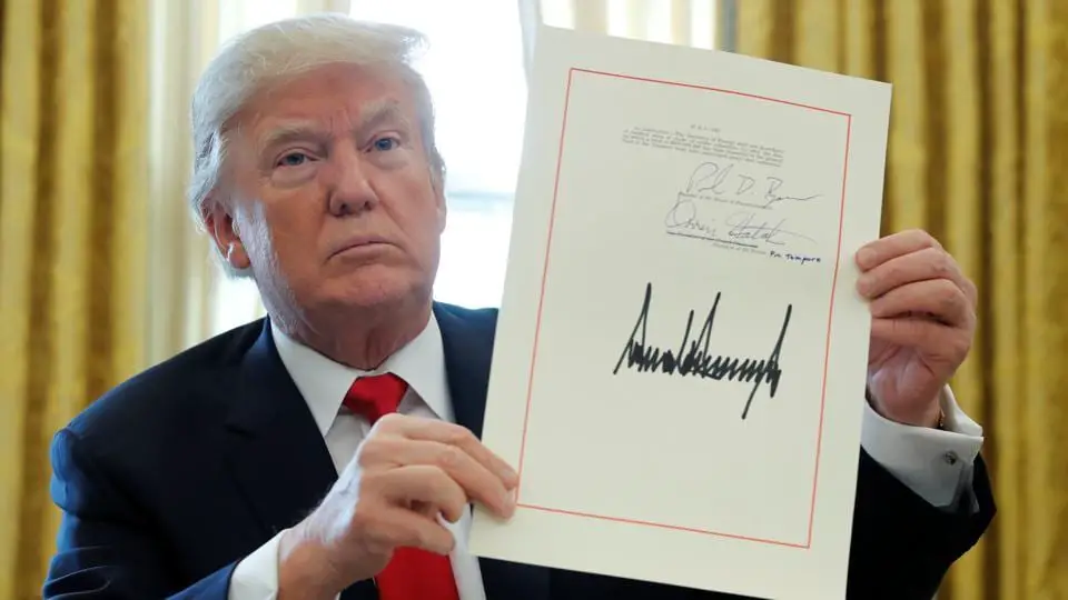 Trump signs tax reform bill, says more products will now ...